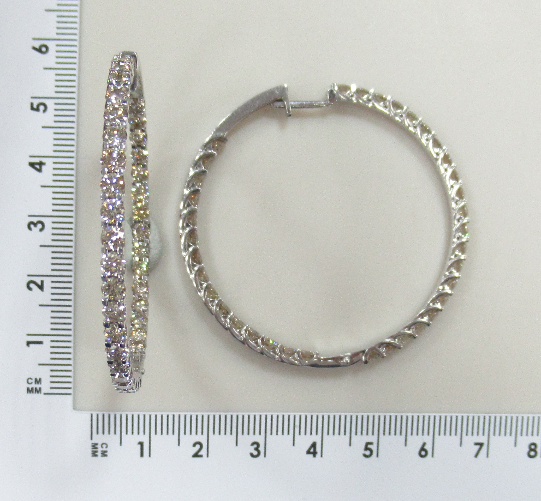 Серьги-конго из белого золота с бриллиантами